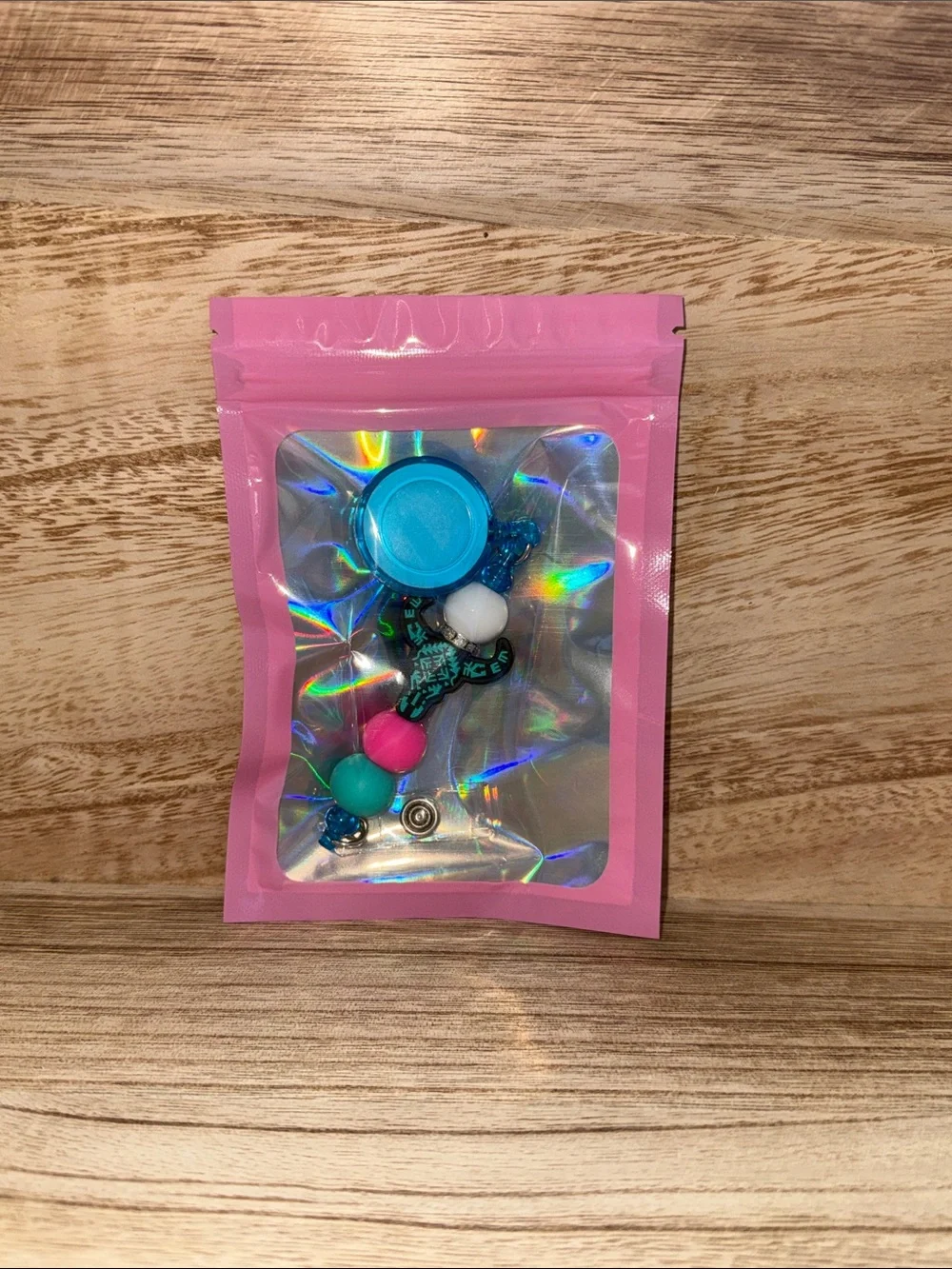 Retractable name badge clip